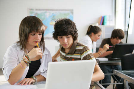 pupils studying in a classroomの写真素材