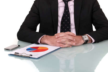 Businessman looking at the results of a marketing surveyの写真素材