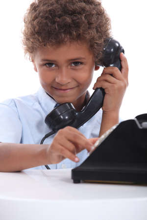Boy on the phoneの写真素材