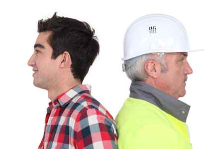 Older workers and young workersの写真素材