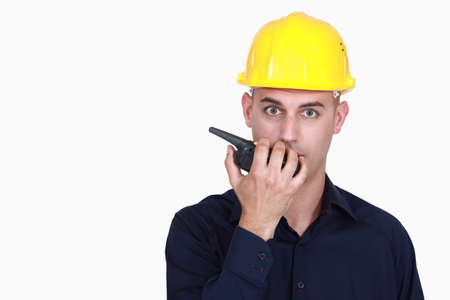 A foreman talking over the phone の写真素材