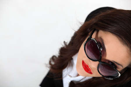 Businesswoman wearing sunglassesの写真素材
