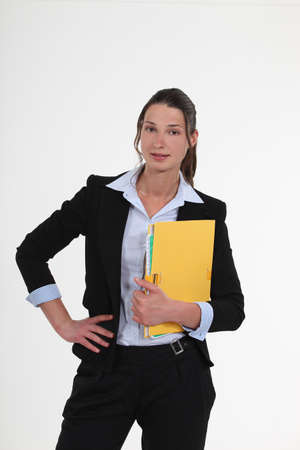 Businesswoman with a folderの写真素材