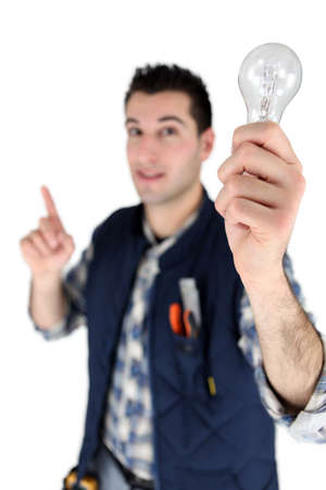 Man holding a light bulbの写真素材