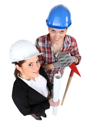 high angle shot of female architect and female bricklayerの写真素材