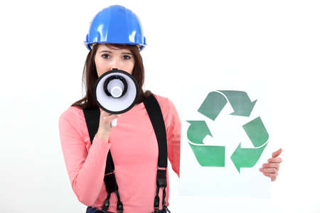 Woman promoting recyclingの写真素材