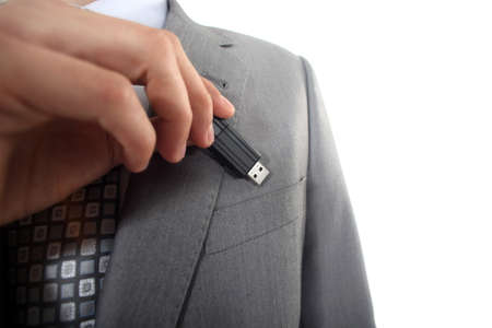 Businessman with USB key in handの写真素材