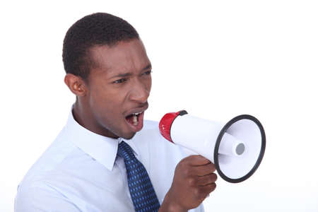 African man shouting through a megaphoneの写真素材