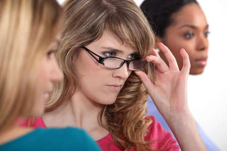 young women looking at somethingの写真素材