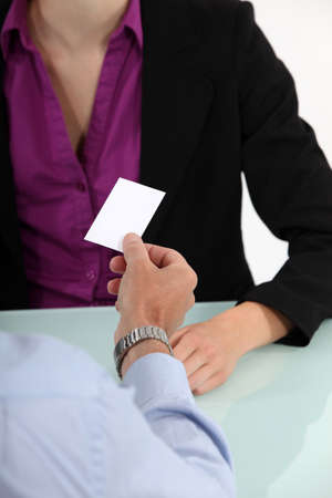 businessman giving his business cardの写真素材