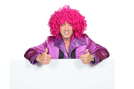 Man with a pink wigの写真素材
