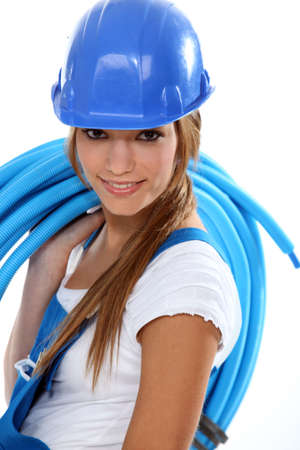 Woman carrying coilの写真素材
