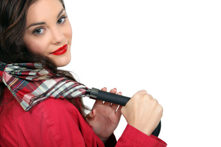 Woman in red with an umbrella