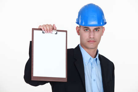 foreman showing clipboard isolated on whiteの写真素材
