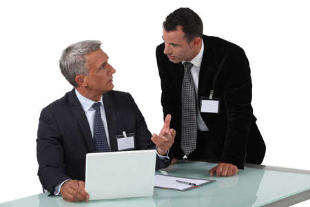 Two businessmen having heated debateの写真素材