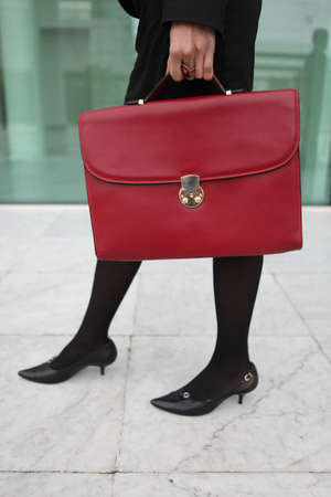 Red leather briefcaseの写真素材
