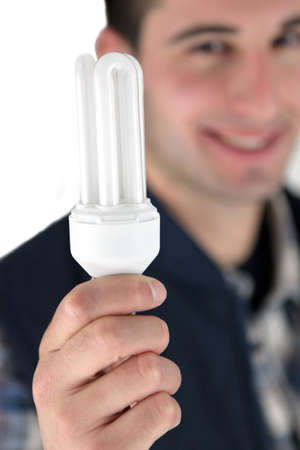 Electrician with a light bulbの写真素材