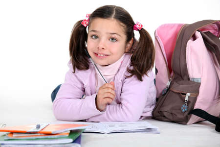 Little schoolgirl with backpackの写真素材