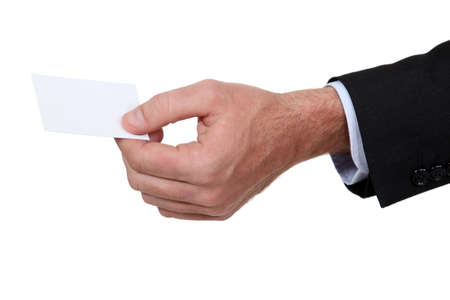 male hand giving visit cardの写真素材