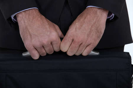 businessman holding a briefcaseの写真素材