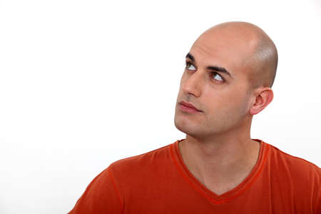 Bald man thinkingの写真素材