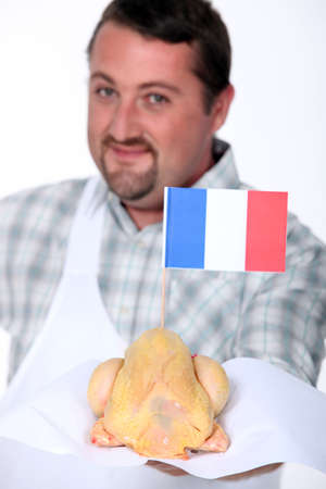 Man with French poultryの写真素材