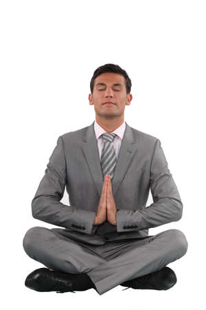 Businessman meditatingの写真素材