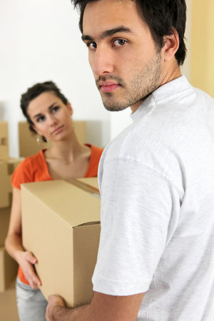 Couple moving cartons
