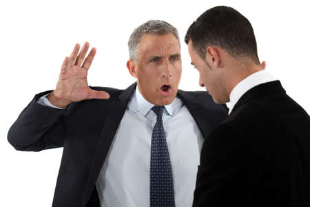 Boss shouting at employeeの写真素材