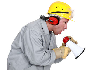 Worker on loudhailerの写真素材