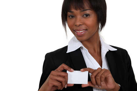 black businesswoman showing visit cardの写真素材