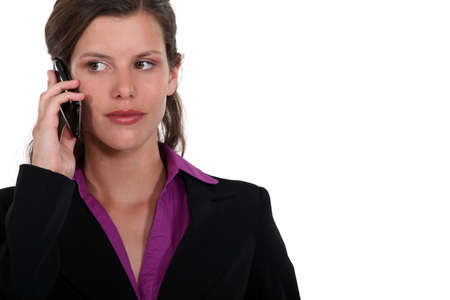 Businesswoman callingの写真素材