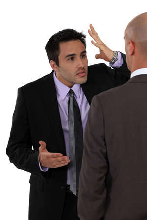 Two businessmen disagreeingの写真素材