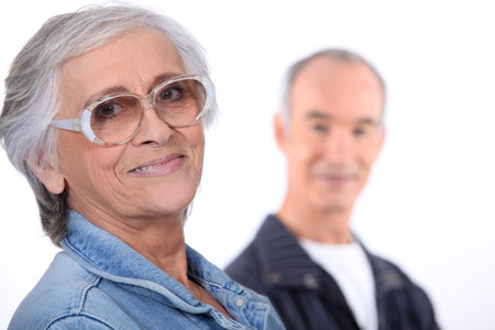 Portrait of a woman with a man in the backgroundの写真素材