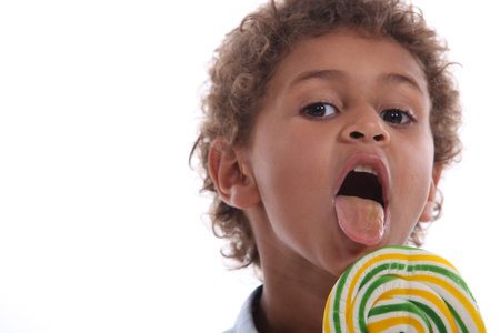 Little boy and lollipop