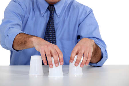 Man moving three vesselsの写真素材