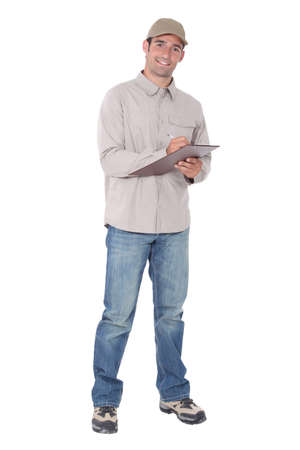 Delivery man with a clipboardの写真素材