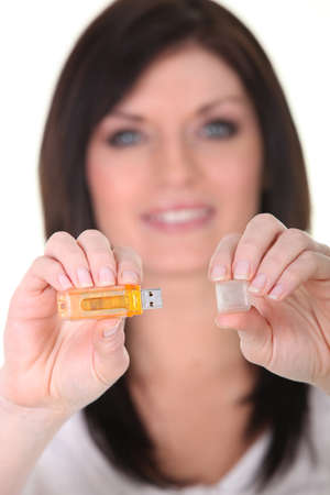 Woman with a usb keyの写真素材