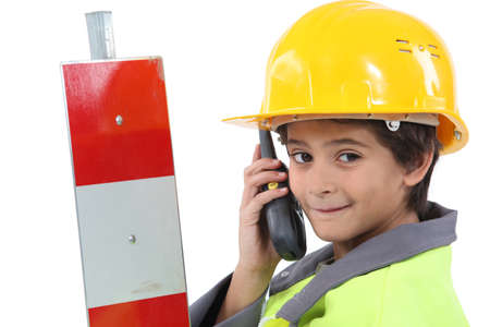 Child with yellow helmetの写真素材