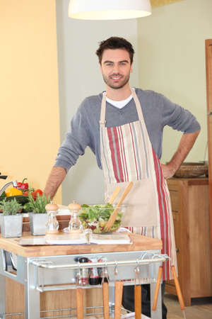 Man cooking at homeの写真素材