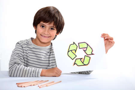 Child drawing recycling symbolの写真素材
