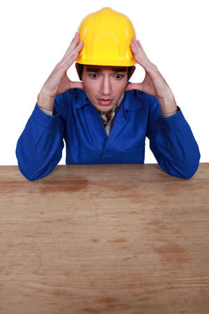 Stressed construction workerの写真素材