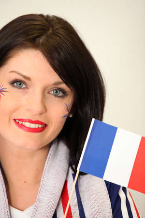 French Supporter waving miniature flagの写真素材