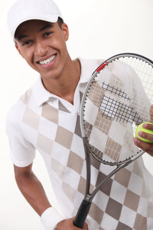 portrait of a teenager with racket