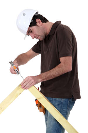 Makin making wooden frameの写真素材