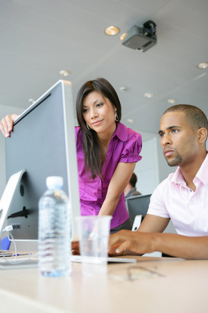 People at work in an office
