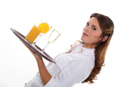 Waitress serving drinksの写真素材