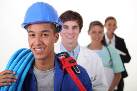 Four workers with different professionsの写真素材