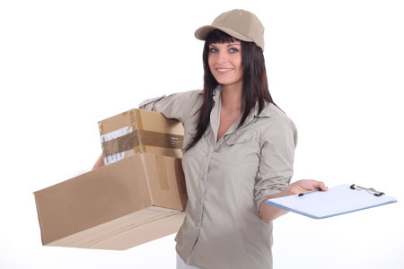 Female courier with parcels and a clipboard