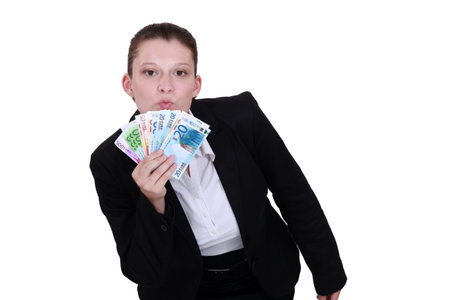Businesswoman showing off her money